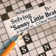 Cracking The Code Sassy Little Brat NYT Crossword Clue